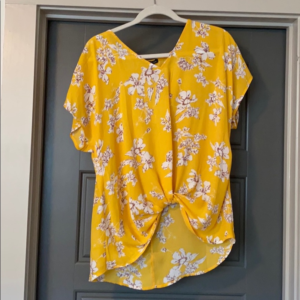 Yellow with flowers top